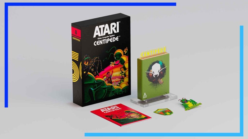 Atari XP 50th Anniversary Centipede cart, postcard, pin, and badge.