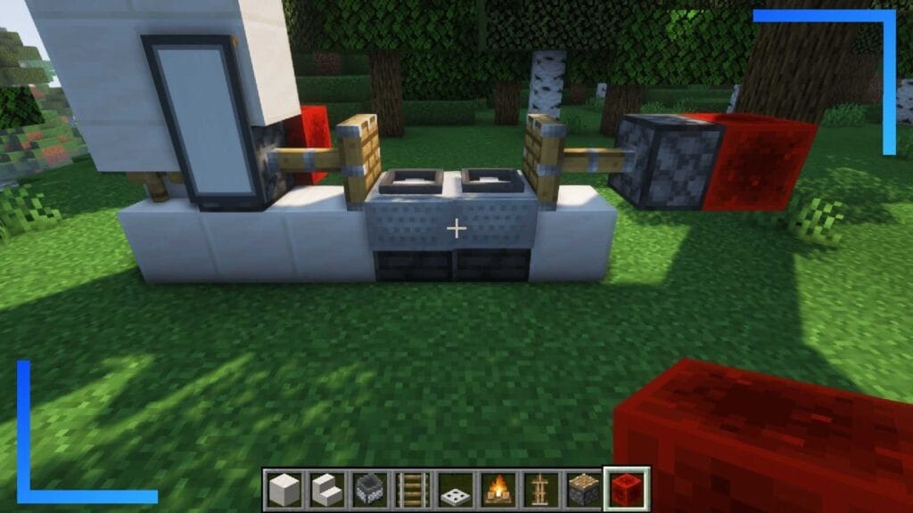 Screenshot showing where to place the redstone blocks.