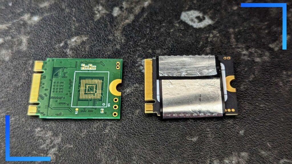 Close-up photo of the original Steam Deck SSD and the new one with the shielding transferred.