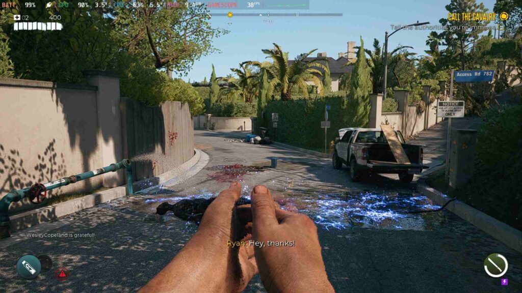 Screenshot from Dead Island 2 showing a man clapping in an LA street and a pool of electrical water runs across the road.