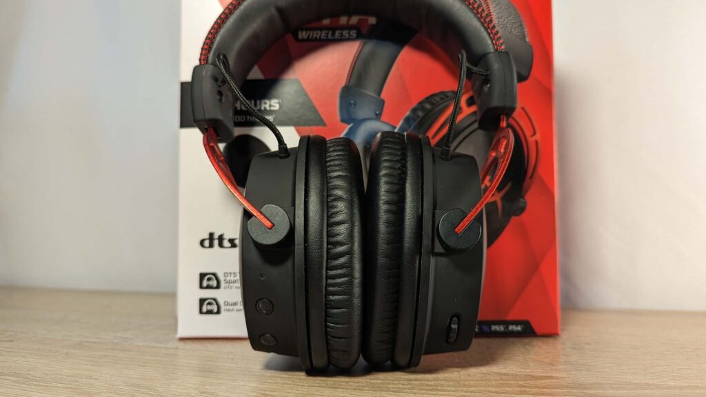 Photo of the HyperX Cloud Alpha Wireless from the front. The red and white HyperX box can be seen in the background.