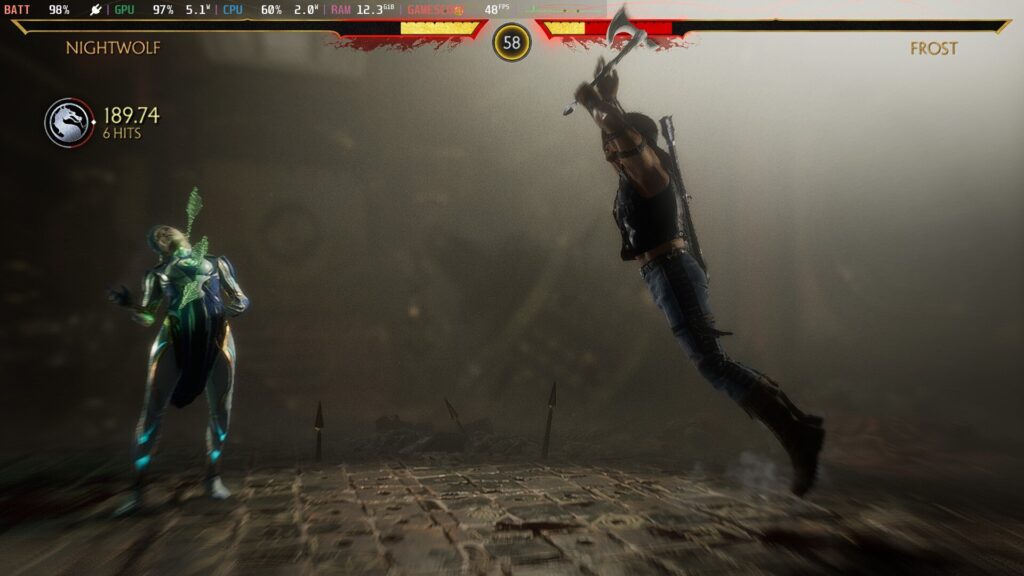 Screenshot from Mortal Kombat 11 on Steam Deck showing two fighters dressed in dark clothing, one of whom is diagonal across the screen.