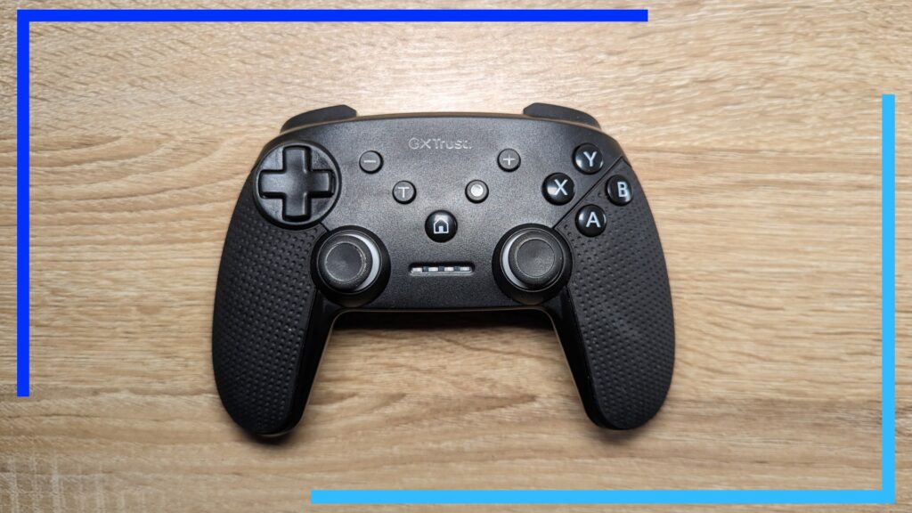 Photo of the black GX Trust Muta wireless controller showing the front of the controller. 