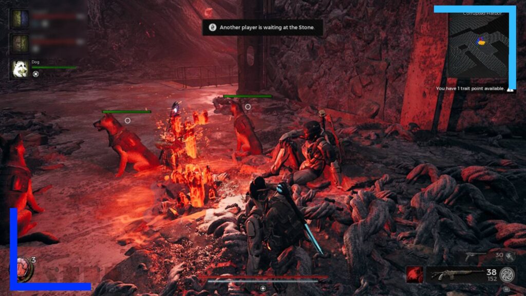 The main character and other co-op partners sit around a red crystal. The glow off the crystal bathes the scene in a red hue.