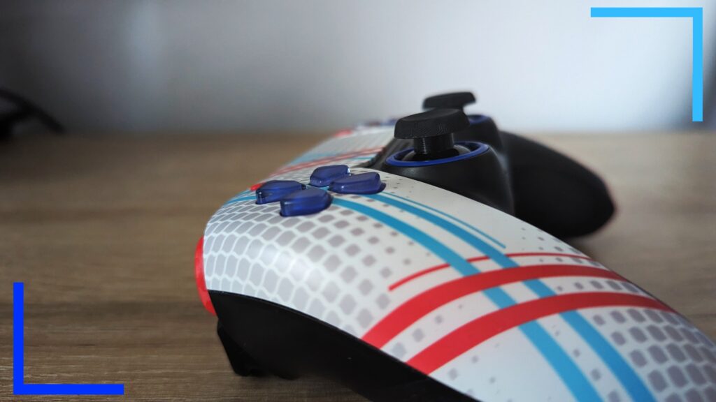 Close up photo of the Scuf controller focusing on the blue d-pad buttons.