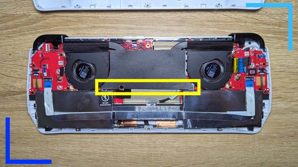 The inside of the ROG Ally with a yellow rectangle showing readers where to grab.