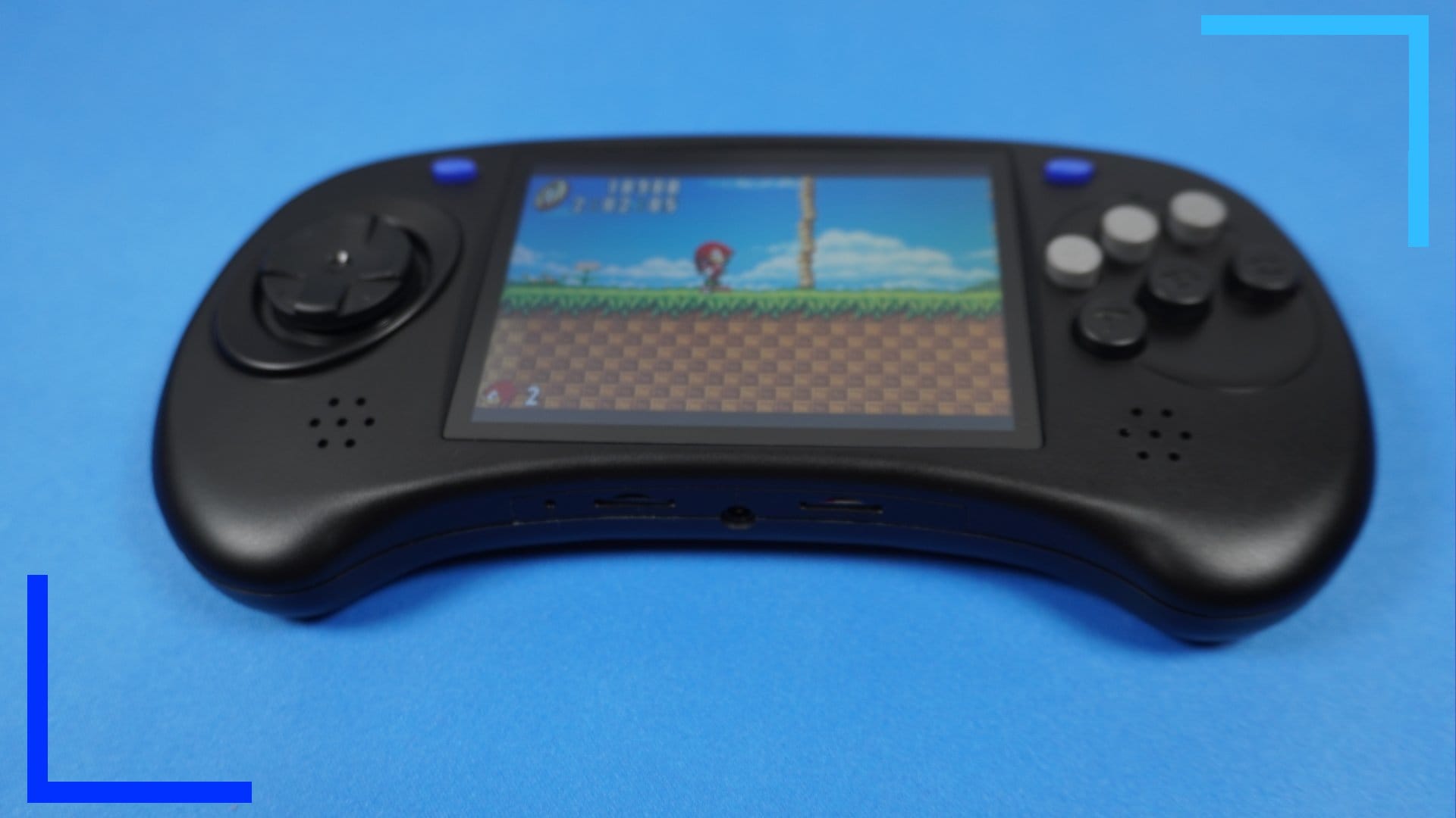 Photo showing the ARC-D in black with Sonic Advance on the screen. 