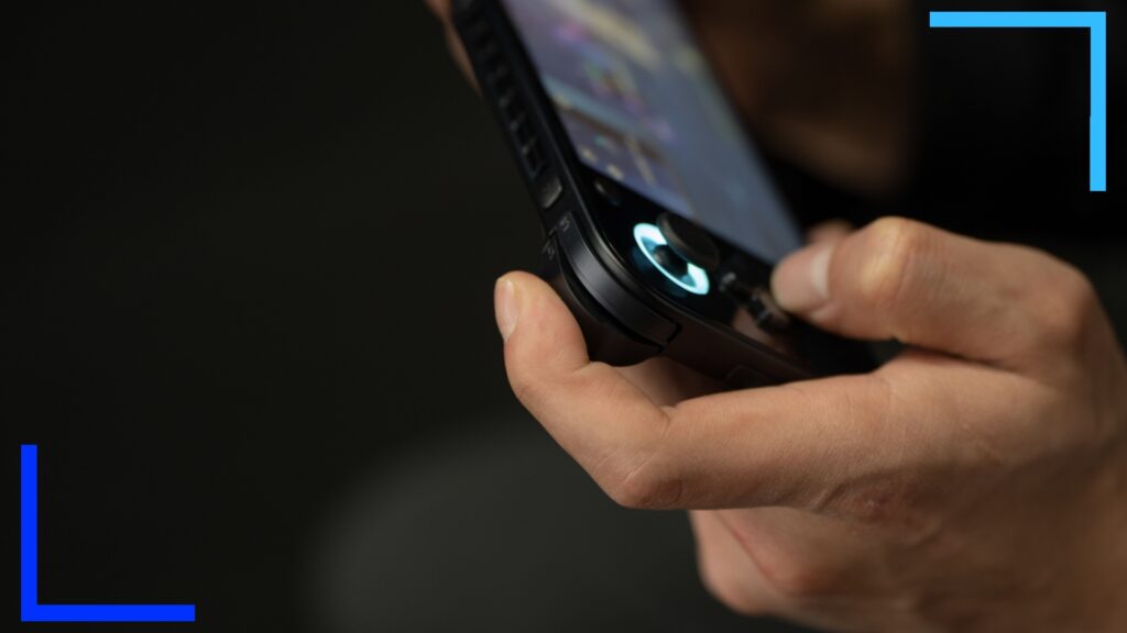 Close up shot of the AYANEO Pocket S left thumbstick with a blue light ring around the base.