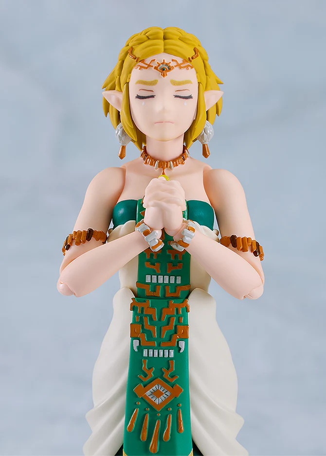 Zelda in a prayer pose.