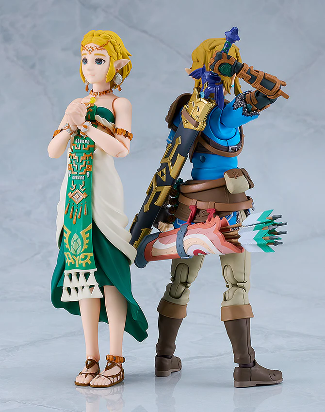 Zelda stands back to back with Link.