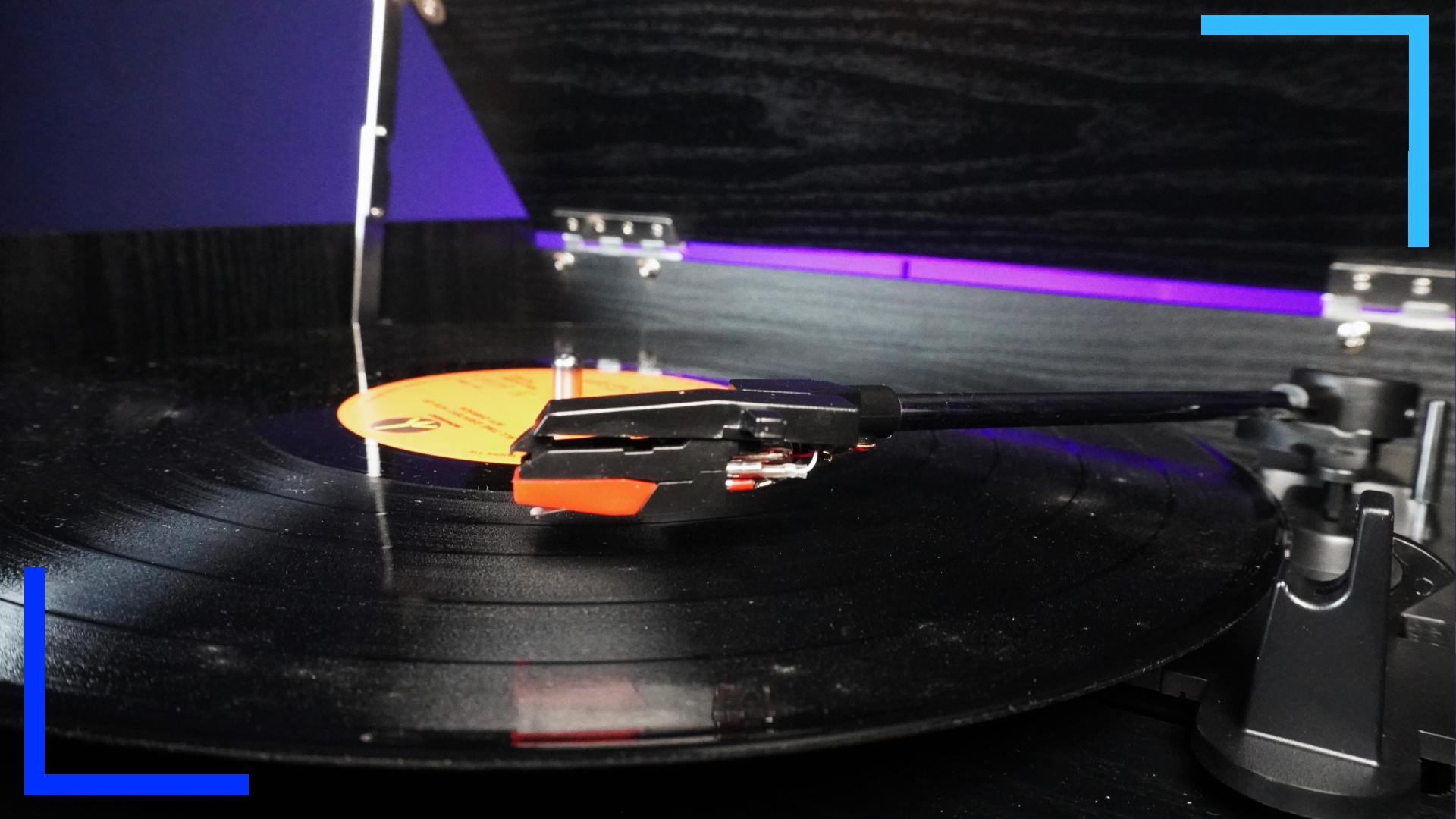 Close-up photo of the main needle arm on the record.