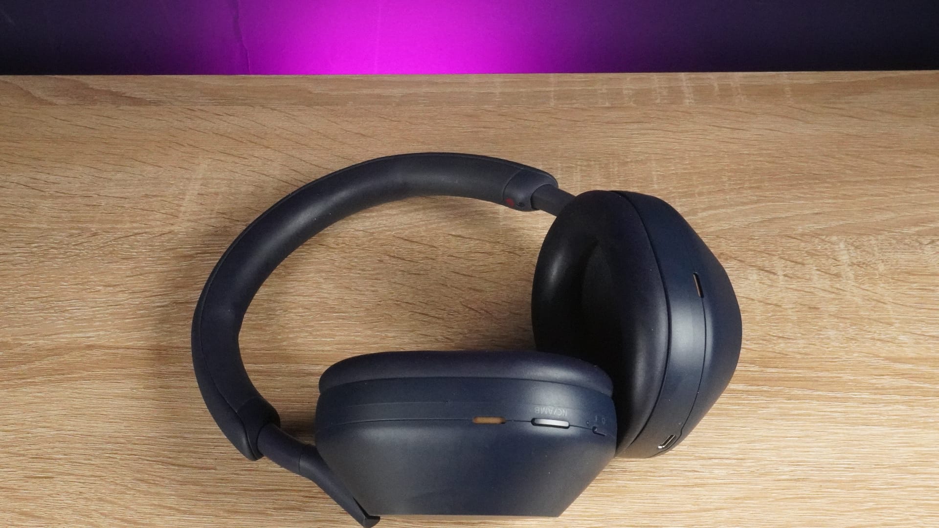 Side view of the Sony WH-1000XM5 headphones.